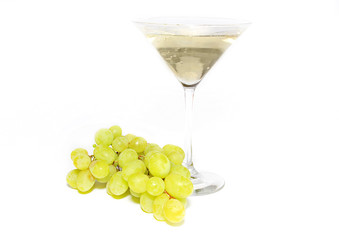 Very sweet white wine in the martini glasses isolated on white