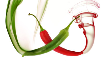red and green hot chili pepper with color smoke on white