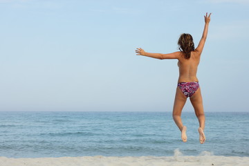 Fototapeta na wymiar Jump on Beach
