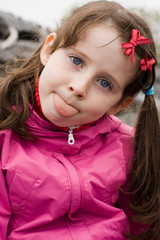 Girl showing her tongue