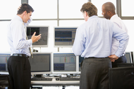 Stock Traders Viewing Monitors