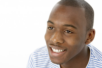 Obraz premium Studio Portrait Of Smiling Teenage Boy