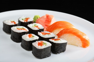 Set of sushi and rolls with a salmon