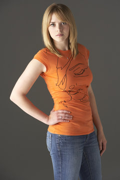 Studio Portrait Of Standing Teenage Girl