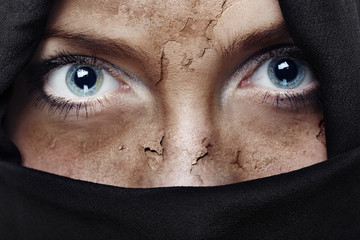 Close up of person face with damaged skin covered by headscarf