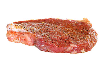 Raw seasoned round steak