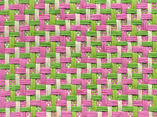 Close up view of webbing in pink, green and white