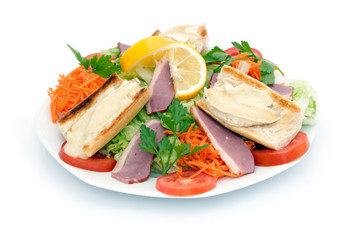 Salade de magret de canard et chèvre chaud