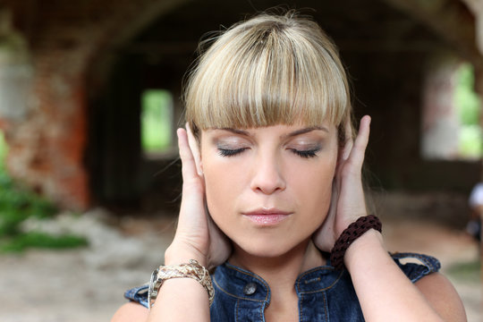listen silence - girl with closed eyes