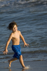 Fototapeta na wymiar Boy in the ocean