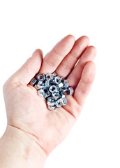 hand with bolts and nuts