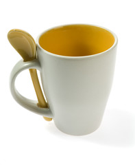 original mug with  spoon  isolated on white