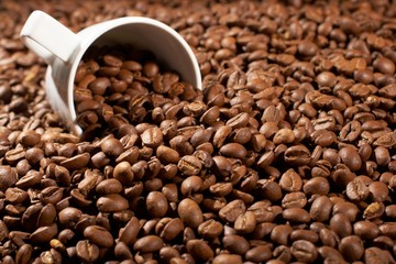 Cup in a grain of coffee