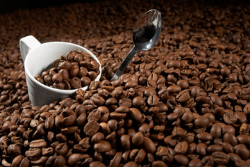 Cup in a grain of coffee