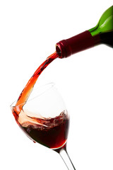 Fototapeta na wymiar Red wine filling a glass, drink