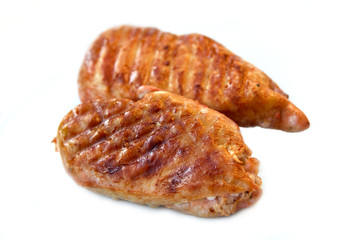 grilled-roasted schnitzel of turkey meat ,isolated