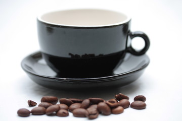 Espresso cup and coffee beans