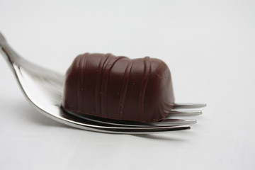 Belgium chocolates on a fork