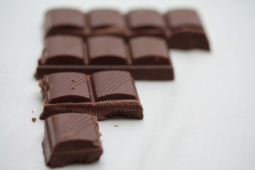 Milk chocolate bar, broken in pieces