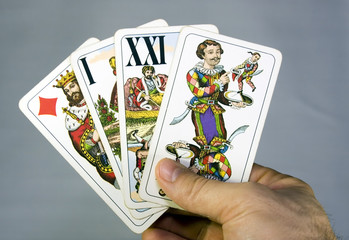 High tarot cards in the hand.
