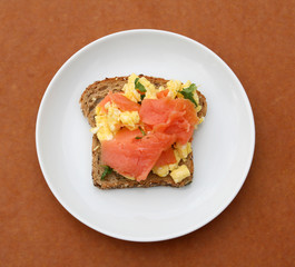 Toast with scrambled egg and lox