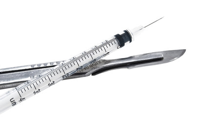 scalpel and syringe
