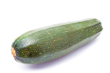 Green zucchini isolated on white