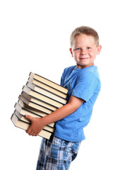 Happy child carrying books