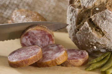 Bread and sausage on plate