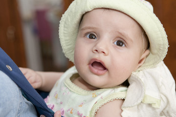 A little girl in a hat