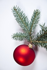 Fototapeta na wymiar Red bauble as a symbol of Christmas