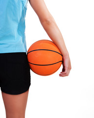 Young beautiful female basket ball player, training