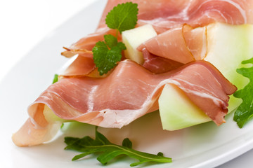 Prosciutto di Parma ham and three slice of melon