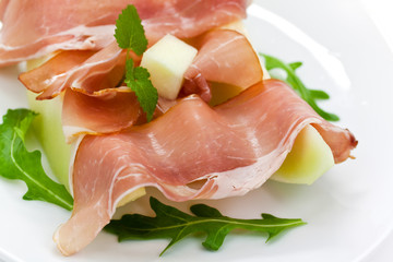 Prosciutto di Parma ham and three slice of melon