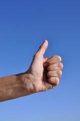 Woman hand - thumb up