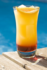 Tequilla Sunrise Cocktail by the Pool