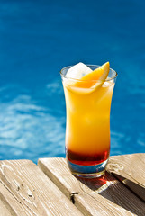 Tequilla Sunrise Cocktail by the Pool