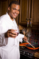 Handsome African American Cooking at Home