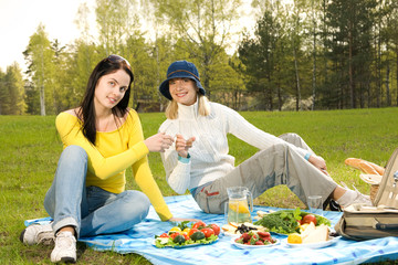 Two beautiful girls at picnic