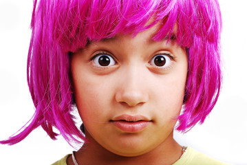 Fototapeta premium Adorable girl with pink hair and facial gesture