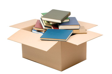 Cardboard box and books isolated on white