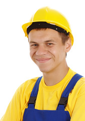 Happy young worker wearing hard hat