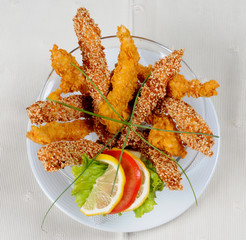 cup of crispy chicken fingers