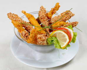 cup of crispy chicken fingers