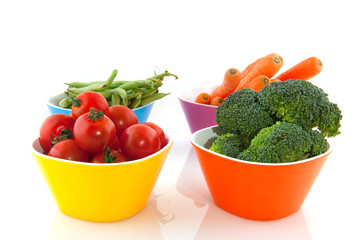 colorful bowls with vegetables