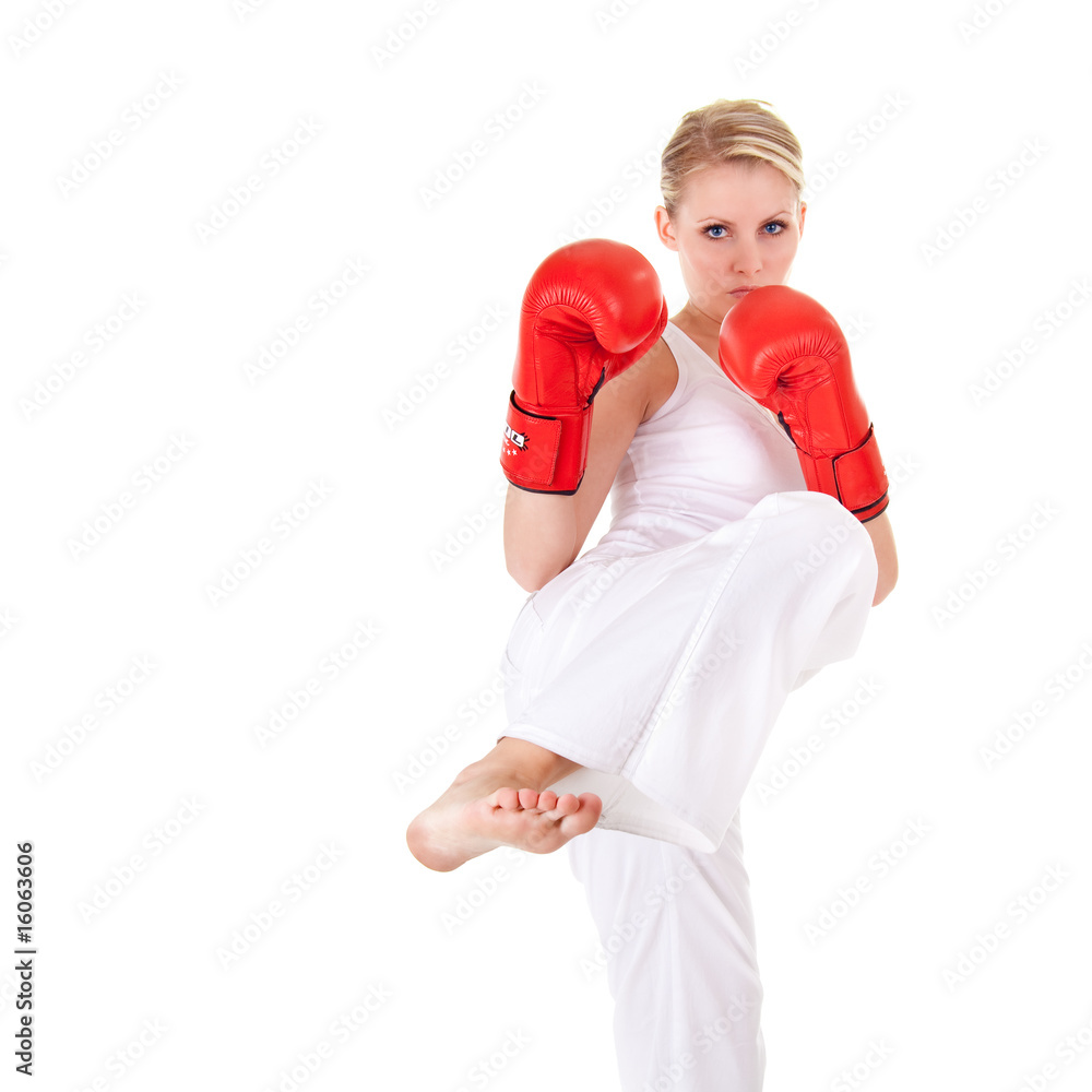 Wall mural young woman as fighter