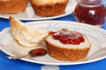 tea biscuit with strawberry jam