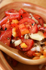 fresh organic tomato salad in a bowl