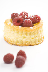 raspberry pastry cream and decorated with lemon parsley