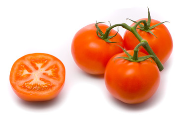 Fresh tomatoes. Macro studio isolated on white.